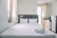 Cozy Living and Homey Studio Green Lake View Apartment By Travelio