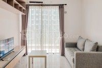 Cozy and Well Designed 2BR Sky House BSD Apartment By Travelio