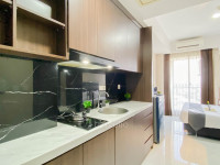 Apartemen Sakura Garden City - Dark Wood Touch Studio at Sakura Garden City Apartment By Travelio
