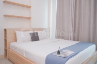 Modern Look and Homey 2BR Apartment Tree Park City BSD By Travelio