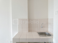 Apartemen Grand Icon Caman - Unfurnished Studio Room at Grand Icon Caman Apartment By Travelio