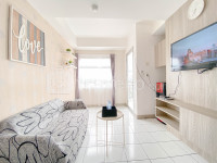 The Stylish 2BR at Grand Asia Afrika Apartment By Travelio