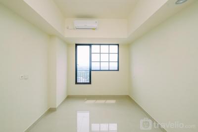 Apartemen Evenciio Margonda - Unfurnished Studio Room with AC at Evenciio Margonda Apartment By Travelio