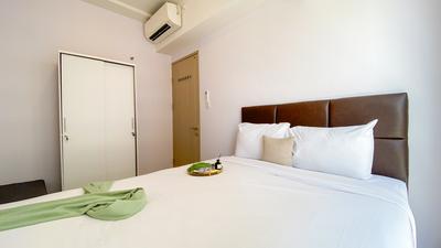 Apartemen Tokyo Riverside PIK 2 - Good and Warm 2BR at Tokyo Riverside PIK 2 Apartment By Travelio