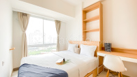 Warm and Homey 2BR Apartment Tokyo Riverside PIK 2 By Travelio