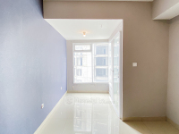 Comfy Unfurnished Studio at 15th Floor T Plaza Apartment By Travelio
