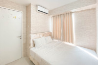 Modern Look 2BR at Bassura City Apartment By Travelio
