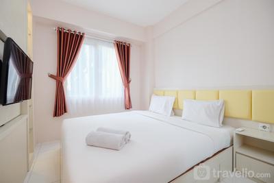 Comfort 2BR at 15th Floor Podomoro Golf View Apartment By Travelio