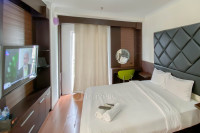 Modern Look Studio at Signature Park Tebet Apartment By Travelio