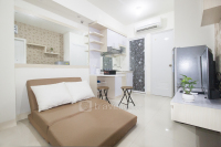Cozy 2BR Apartment at 21st Floor Green Pramuka City By Travelio