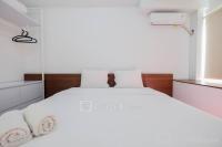 Town View 1BR at Patraland Urbano Apartment By Travelio