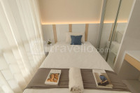 Comfortable 2BR near ITS University at Bale Hinggil Apartment By Travelio