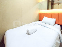 Homey and Simply 2BR at Puncak Permai Apartment By Travelio