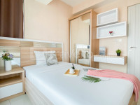 Simple and Homey 2BR at Grand Kamala Lagoon Apartment By Travelio