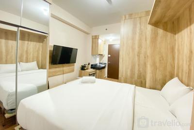 Chic and Cozy Studio at Transpark Cibubur Apartment near Mall By Travelio