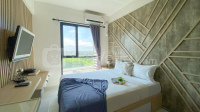 Homey and Clean Studio at Sky House Alam Sutera Apartment By Travelio