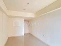 Apartemen Meikarta - Functional Unfurnished Studio at Apartment Meikarta with AC By Travelio