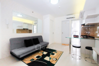 2BR Bassura City Apartment with Mall Access By Travelio
