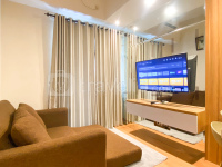 Comfy and Modern Look 1BR LRT City Jatibening Apartment By Travelio