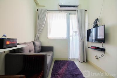 Tranquil 2BR at Green Pramuka City Apartment By Travelio