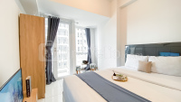 Basic Studio Room at Tokyo Riverside PIK 2 Apartment By Travelio