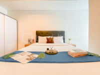 Modern and Homey 2BR at Apartment Aspen Residence By Travelio