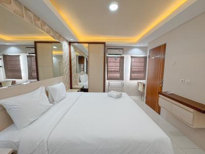 Spacious and Cozy Living 2BR Combined Unit at Puncak Kertajaya Apartment By Travelio