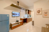 1BR with Direct Access to Pool at Parahyangan Residence Apartment By Travelio