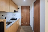 Apartemen Cisauk Point - Warm Wooden Touch Studio Room at Apartment Cisauk Point By Travelio