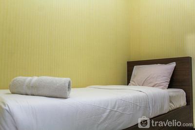 Comfortable and Tranquil 2BR Apartment at Green Pramuka City By Travelio