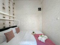 Apartemen Puncak Permai - 2BR near Lenmarc Mall at Puncak Permai Apartment By Travelio