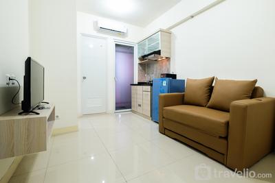 Comfortable 2BR Green Pramuka City Apartment By Travelio