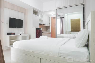 Homey and Comfy Studio at The Nest Puri Apartment By Travelio
