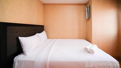 Apartemen Puncak Dharmahusada - Homey 2BR with Extra Room at Puncak Dharmahusada Apartment By Travelio