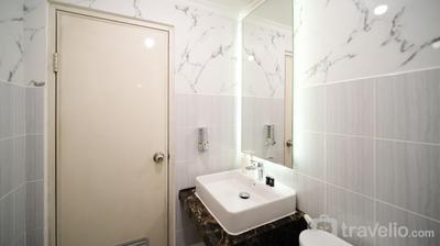 Apartemen Puncak Dharmahusada - Spacious 3BR Combined at Puncak Dharmahusada Apartment By Travelio