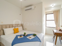 Cozy Minimalist 2BR Apartment at Transpark Cibubur By Travelio