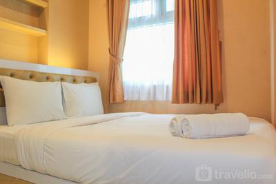 Minimalist and Homey 2BR Apartment at Green Pramuka City near Mall By Travelio