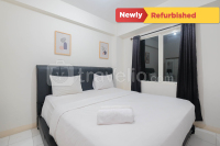 Comfort and Homey 2BR at Podomoro Golf View Apartment By Travelio