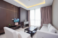 Modern and Comfy 2BR with Extra Room at Four Winds Apartment By Travelio
