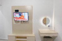 Simple White Studio Apartment at The Alton Semarang By Travelio