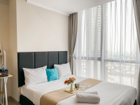 Modern Look 1BR Apartment Menara Jakarta Kemayoran By Travelio