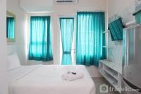 Cozy Living Studio Room at Grand Icon Caman Apartment By Travelio