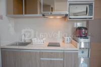 Apartemen Grande Valore Condominium - Wonderful and Pool View 1BR Apartment Grande Valore Condominium By Travelio