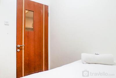 Apartemen Puncak Dharmahusada - Exquisite 2BR Apartment at Puncak Dharmahusada By Travelio