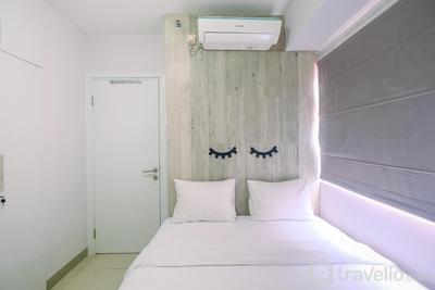 Green Pramuka City 1BR Apartment with Modern Style and City View By Travelio