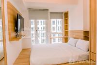 Comfy Studio at 30th Floor Tokyo Riverside PIK 2 Apartment By Travelio