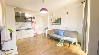 Modern and Comfy 3BR Bassura City Apartment By Travelio