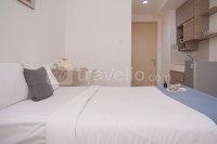 Modern and Homey Studio Apartment Tree Park City BSD By Travelio