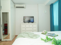 Apartemen Capitol Suites - Chic and Warm Studio Room at Apartment Capitol Suites By Travelio
