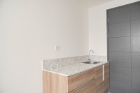 Apartemen Collins Boulevard - Unfurnished Studio with AC at Collins Boulevard Apartment By Travelio